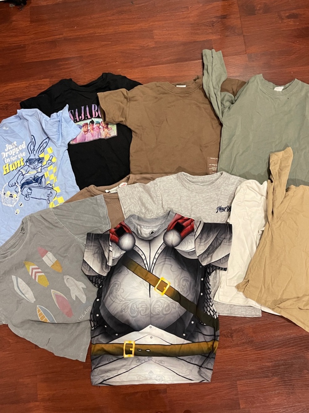 bundle of kids t shirts . between two to 4 years .